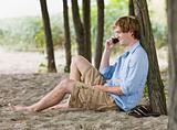 Man talking on cell phone outdoors