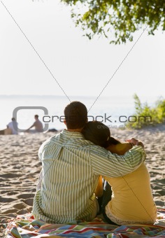 Couple hugging at beach
