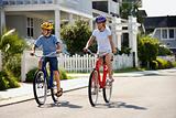 Boy and Girl Riding Bikes