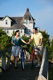 Couple on Bridge with Bicycles