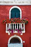Arched Window with Balcony and Flowers