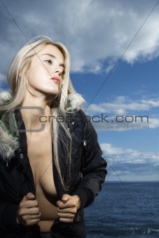 Attractive Woman Opening Her Coat