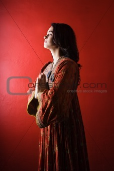 Young Woman Praying. Isolated