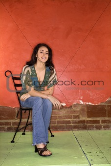 Young Woman Sitting in Chair