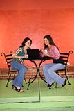 Two Young Women Having Coffee