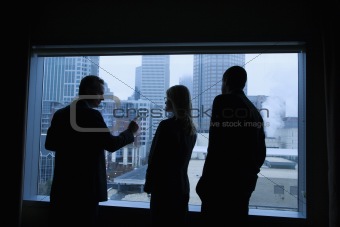 Businesspeople Looking Out the Window