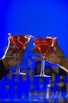 Toasting Cocktails in Martini Glasses