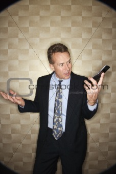 Angry Businessman on Cell Phone