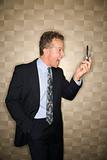 Businessman Yelling at Cell Phone