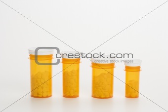 Yellow Medicine Bottles With Pills. Isoated