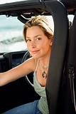 Smiling Woman Sitting in Car