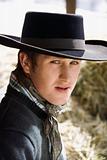 Attractive Young Man Wearing a Black Cowboy Hat