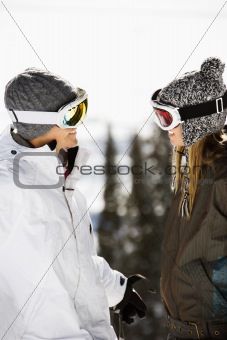 Two Skiers Smiling at Each Other