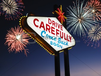 Leaving Las Vegas Sign With Fireworks in Background