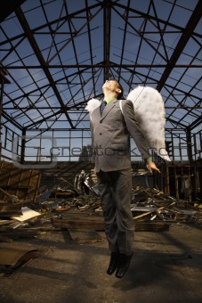 Young Businessman With Angel Wings