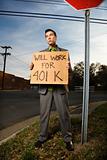 Young Businessman Holding 401k Sign