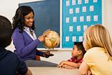 Teacher Holding Globe