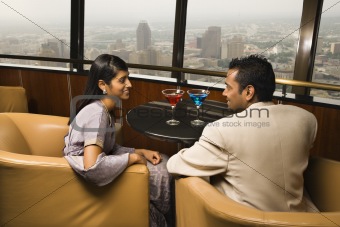 Well-Dressed Couple in Bar