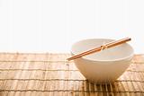 Chopsticks on an Empty Bowl. Isolated