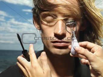 Young Male Getting Eyelashes Curled