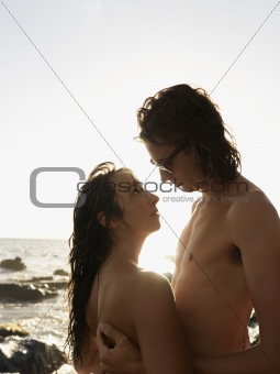 Attractive Young Topless Couple Embracing