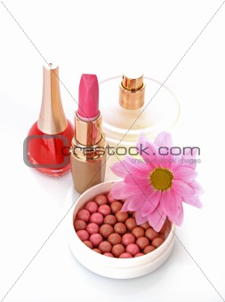 Many colourful woman cosmetics with flower   on white white back