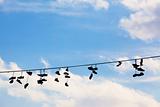 sneakers hanging on a wire to mark drug sale area
