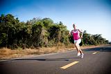 Blond woman running cross country