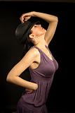 beautiful woman wearing hat and dancing