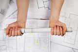 The achitecture plan in human hands