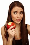 The girl eats a apple