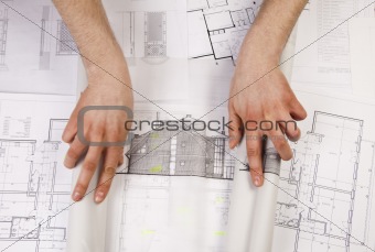 The achitecture plan in human hands