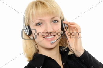 Customer Representative with headset smiling during a telephone conversation