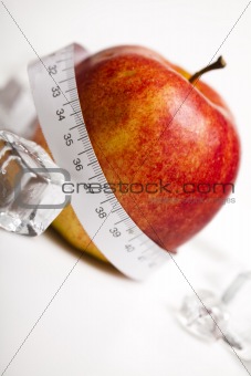 Tape measure and apple
