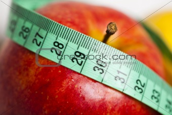 Apple and measurement tape