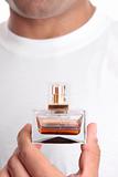 Man holding perfume aftershave