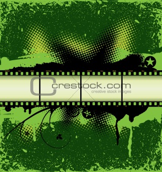 Filmstrip on green grunge background