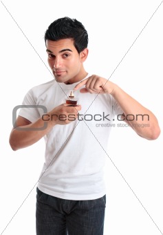 Man pointing to a bottle of perfume