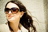Portrait of a beautiful young woman with sunglasses