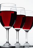 Three red wine glasses