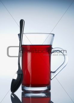 Cup of red fruit tea