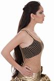 Side pose of a belly dancer with long hair