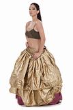 Traditional belly dancer in golden costume