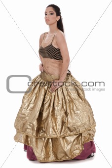Traditional belly dancer in golden costume