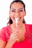 cute women brusing her teeth