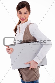 young womencarrying a laptop 