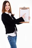 Business women pointing on a blank clip board