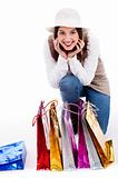 Young woman display all her shopping bags