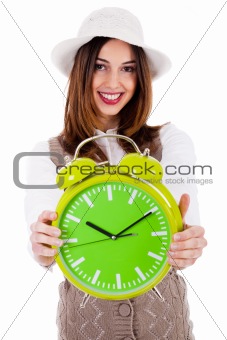 Beautiful young model with hat and showing clock