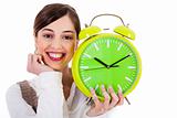 attractive young model smiling and holding the clock